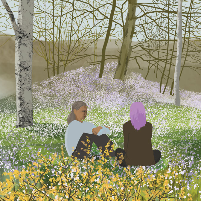 2 people siting in a spring garden
